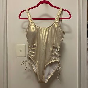 Light gold metallic lace up side, deep scoop back one piece swimsuit
